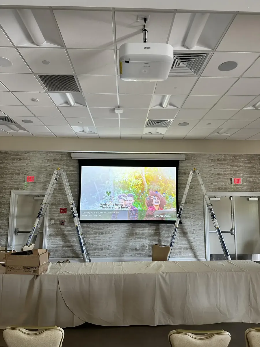 Projector and sound system installation at Addison Village Viera FL by The Electpros