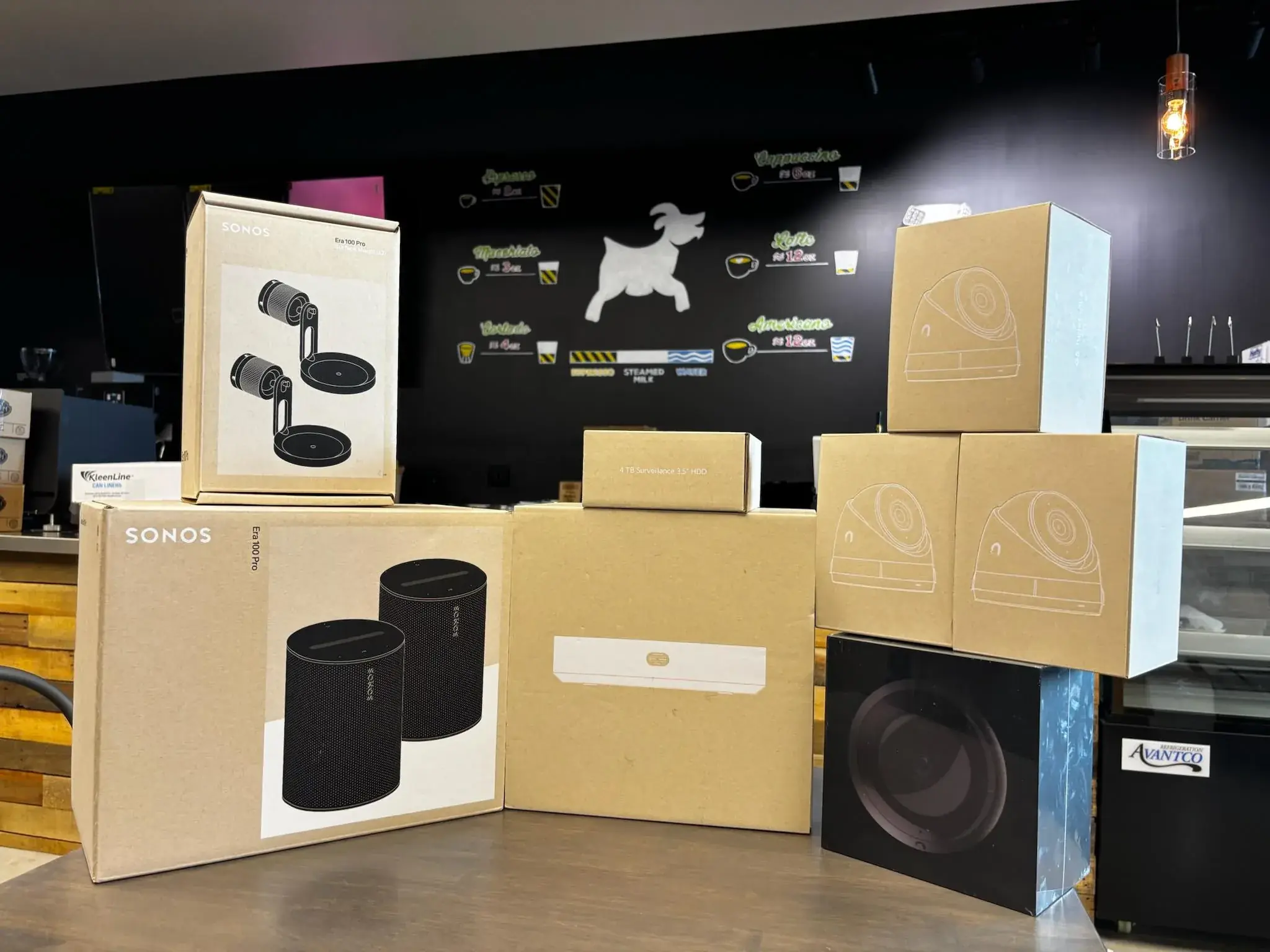 Sonos Era 100 Pro speakers and security cameras delivered for Lucky Goat Coffee Co Melbourne FL installation