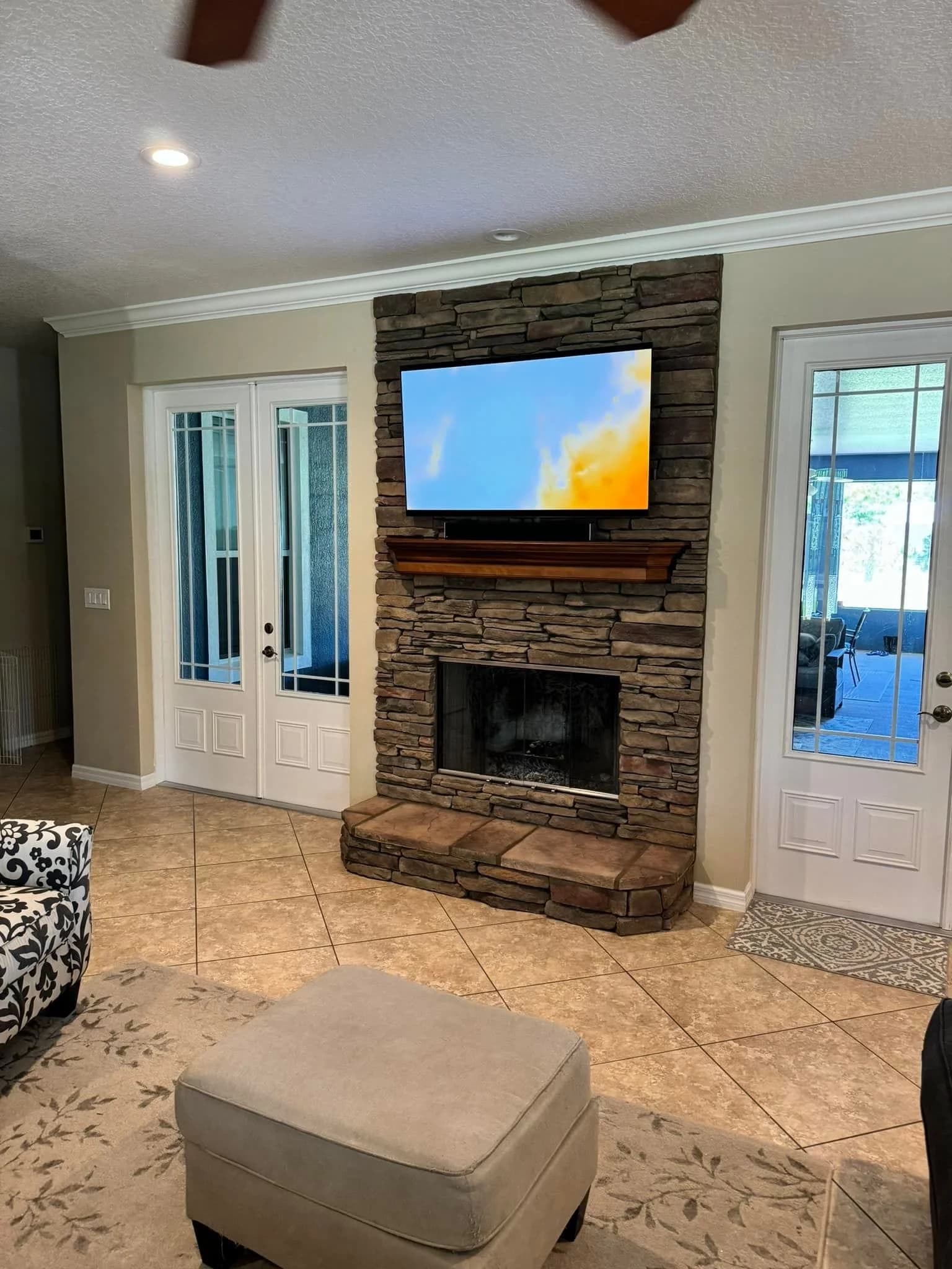 Living room TV mounted with hidden in-wall cables