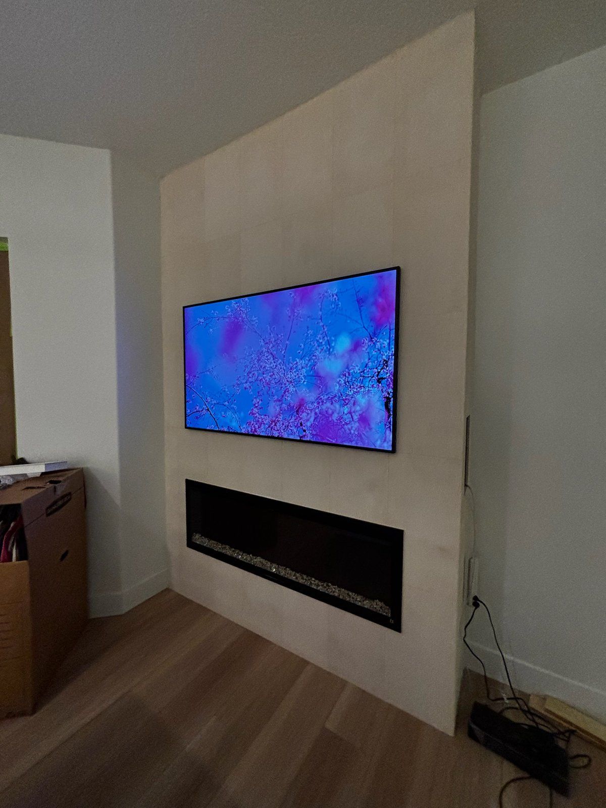 Home theater projector screen installation in a Brevard County bonus room by The Electpros